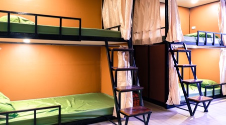 8-bed dorm room with bunks